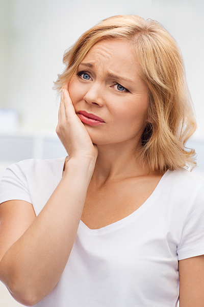 Dentistry by the Bay providing emergency dental services for a patient